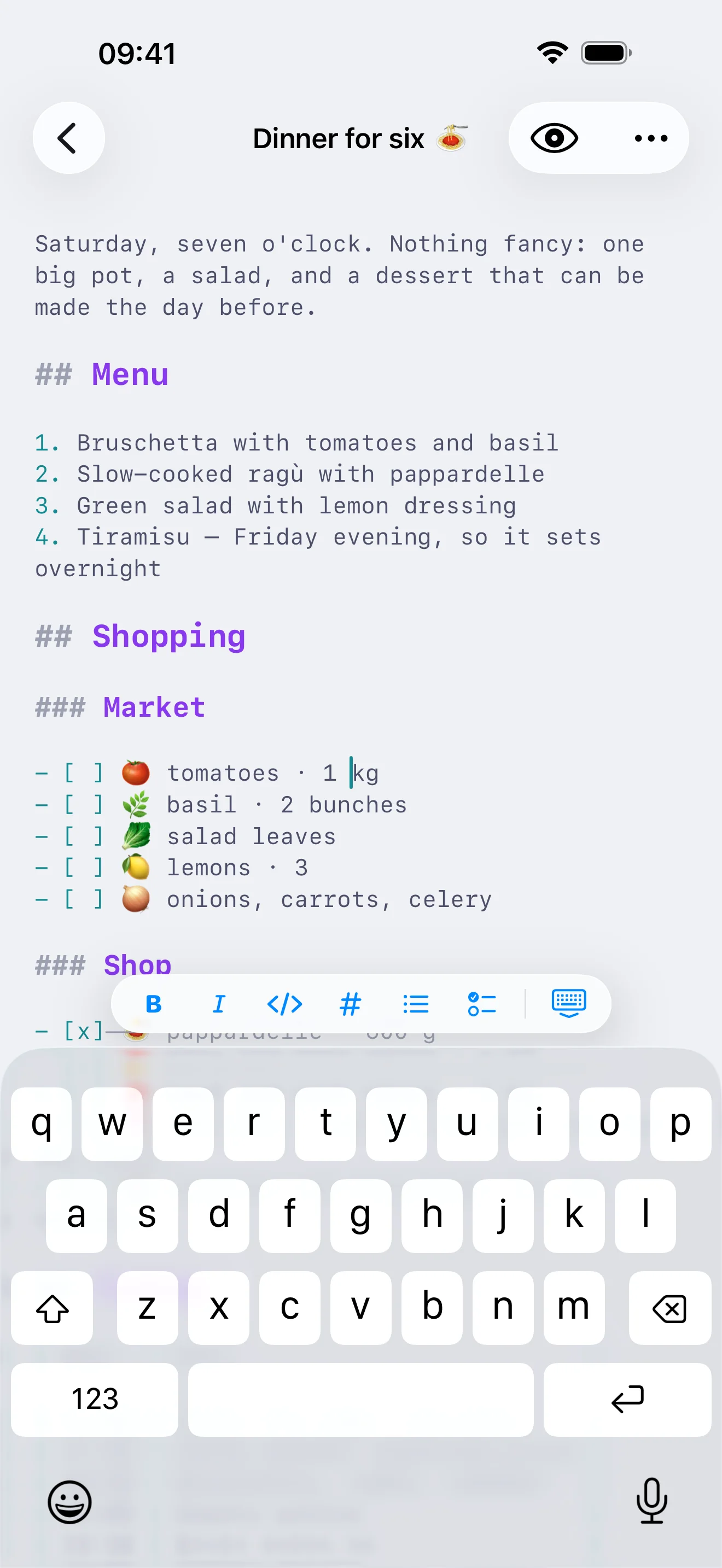 Writing on iPhone with the formatting bar for bold, italic, code, headings, lists and tasks floating above the keyboard.